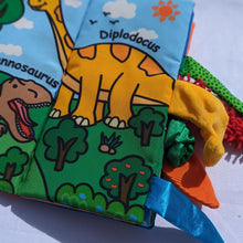 Load image into Gallery viewer, Jollybaby Dinosaur Tails Cloth Book
